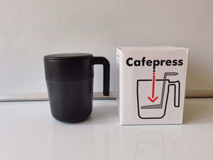 Coffee brewing cup with filter