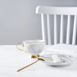 Marbled ceramic coffee cup and saucer