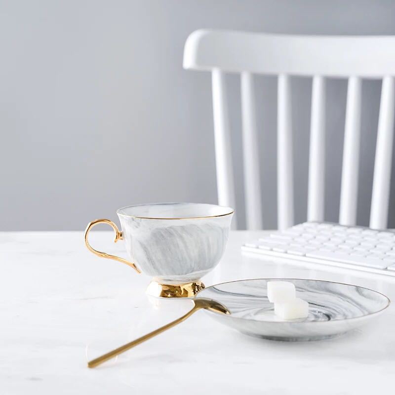 Marbled ceramic coffee cup and saucer