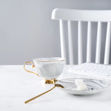 Marbled ceramic coffee cup and saucer