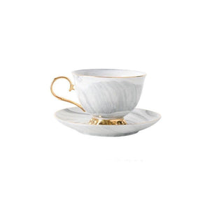 Marbled ceramic coffee cup and saucer