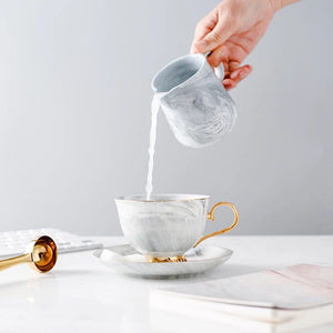Marbled ceramic coffee cup and saucer