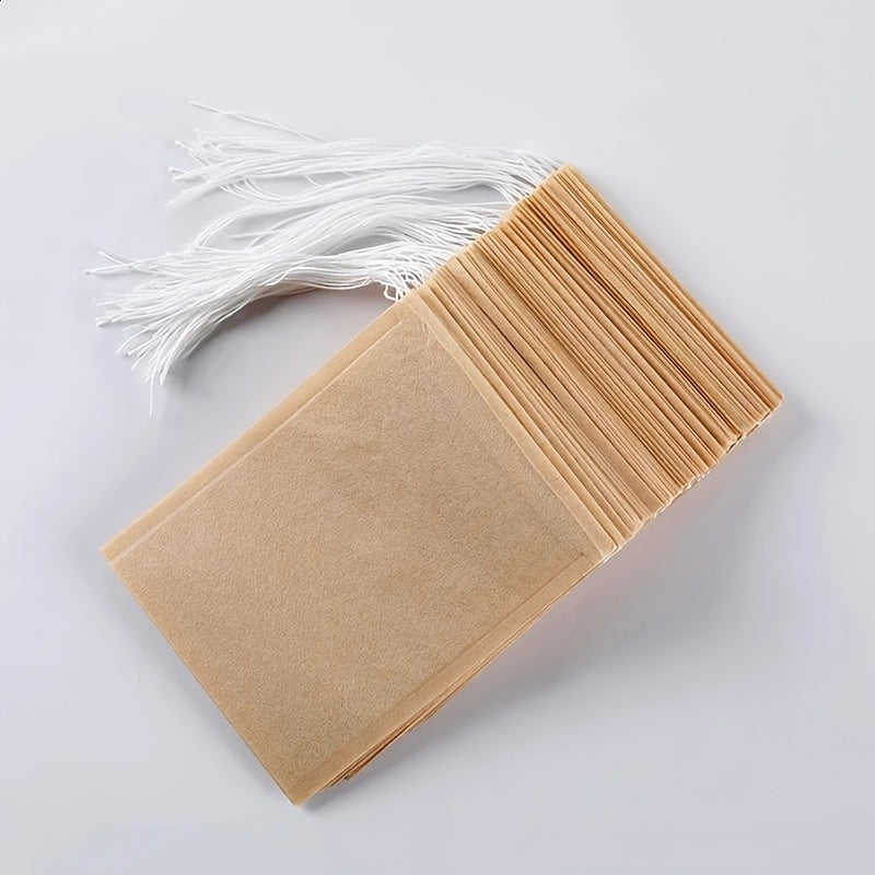 100pcs Natural Biodegradable Drawstring Filter Paper Bags for Coffee, Tea, and Food - Safe and  - Disposable Tea Brewer and Empty Tea Bag with Pine Leaf Powder and Herbs - Perfect for Brewing and Serving